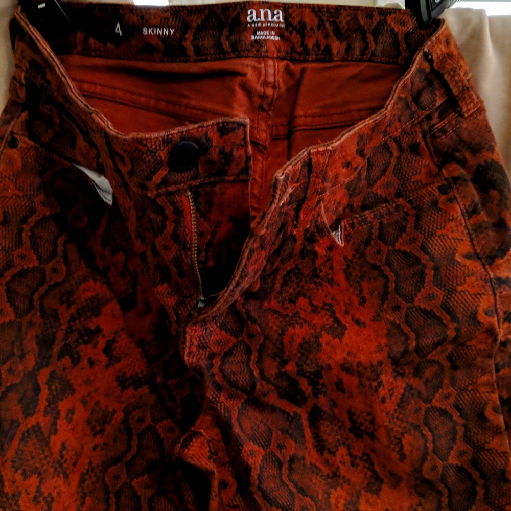 Snakeskin skinny jeans